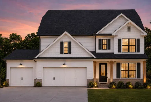 Two-story white house with black shutters and three-car garage at sunset with lit windows and porch lights.